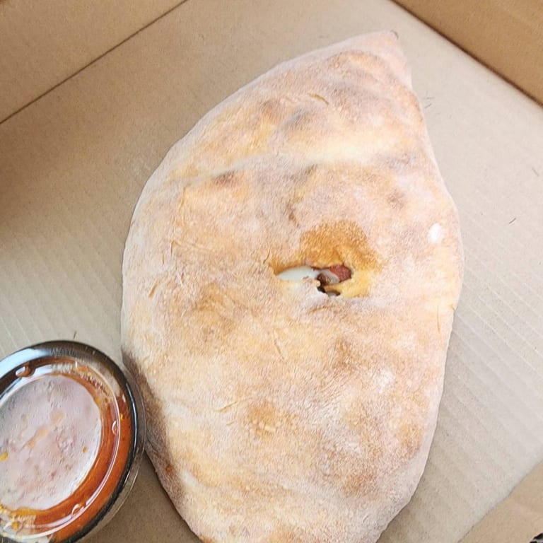 Savor Our Authentic Calzone